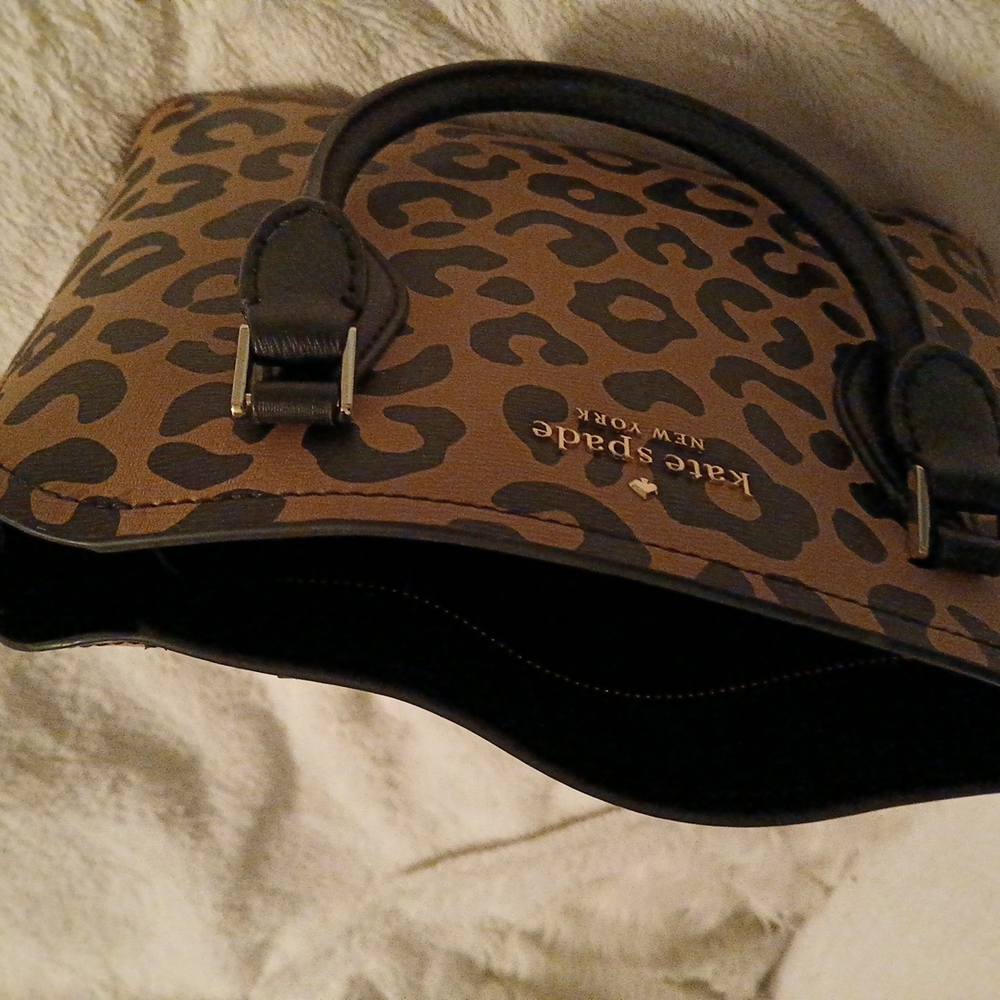 Kate Spade Brown Leopard Print Pocket Book.